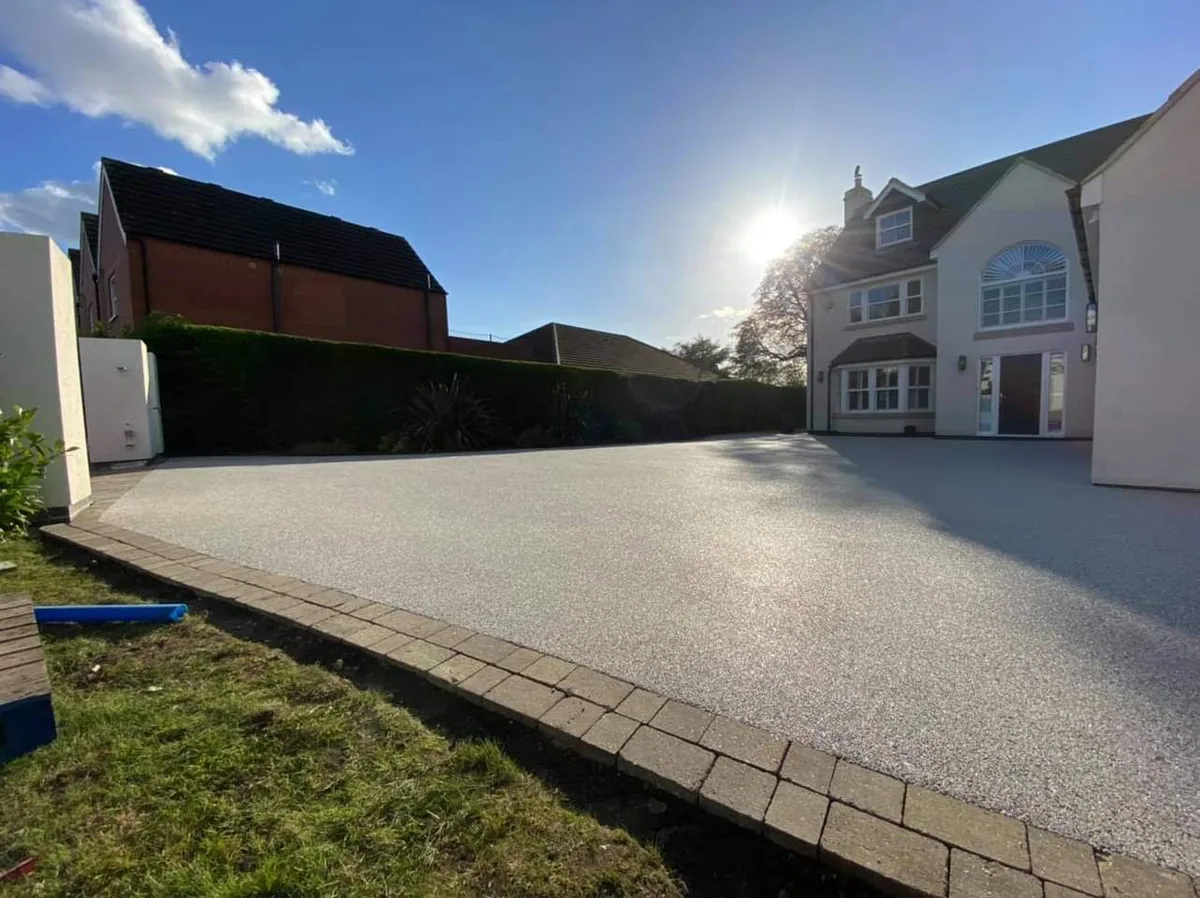 Large resin bound driveway installed by A.L. Landscapes on a detached house in Manchester