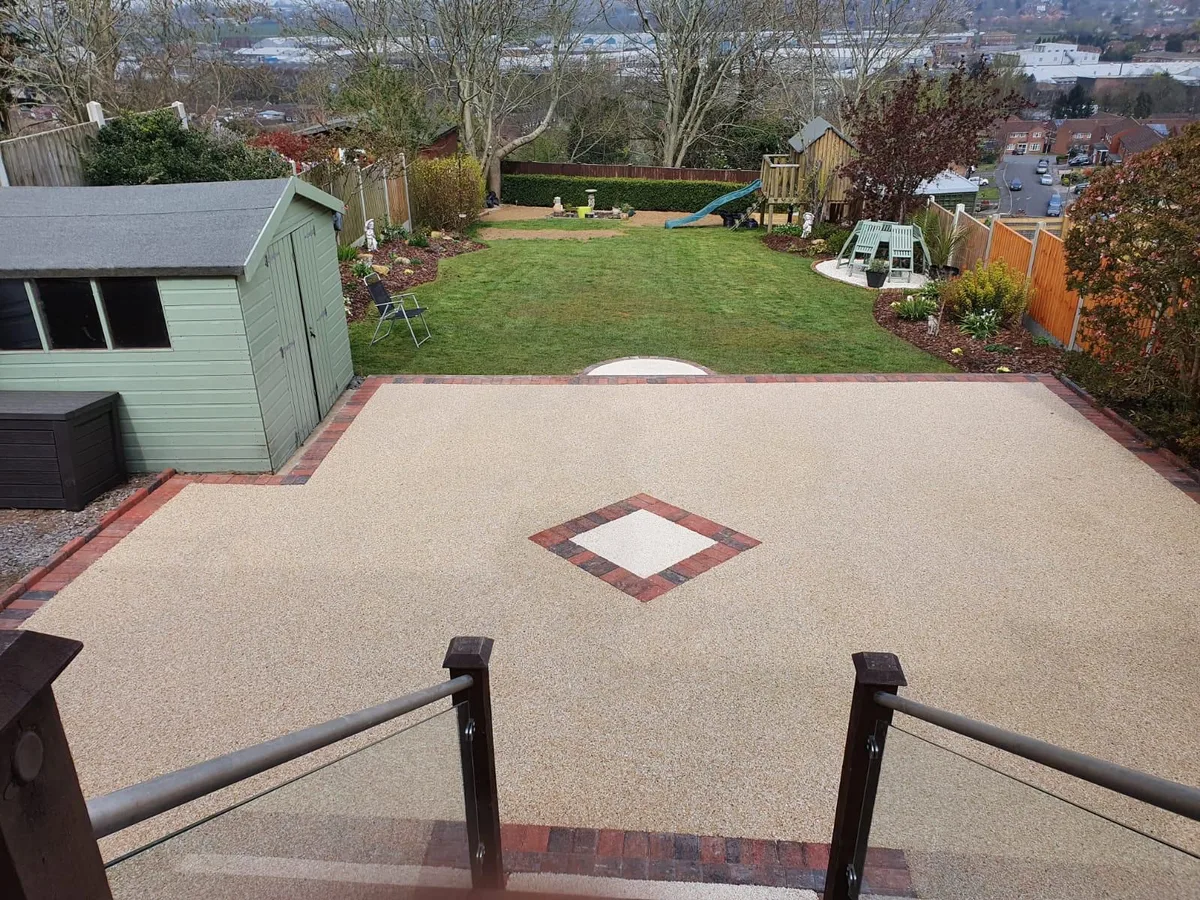 Elevated resin patio with garden views in Manchester